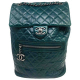 Chanel green leather backpacks