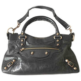 Balenciaga first black leather handbag