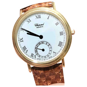 Chopard gold yellow gold watch