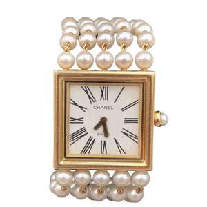 Chanel mademoiselle white yellow gold watch