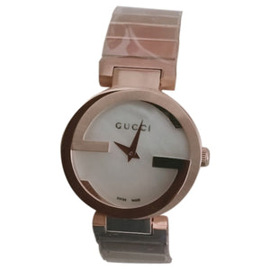 Gucci interlocking gold steel watch