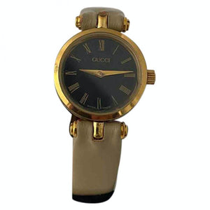 Gucci gold steel watch