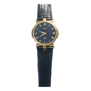 Gucci black gold plated watch