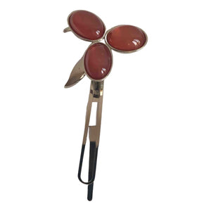 Bvlgari orange metal hair accessories