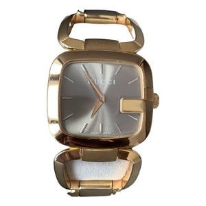 Gucci gold steel watch