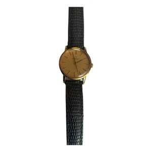Omega gold yellow gold watch