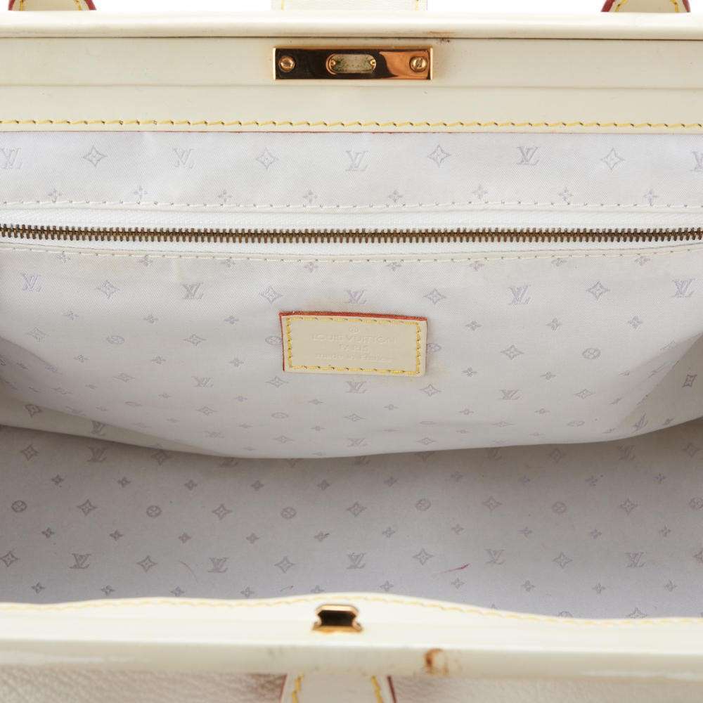 LOUIS VUITTON  Ivory Speedy Frame