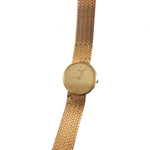 Chopard gold yellow gold watch