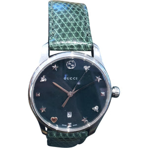 Gucci green steel watch