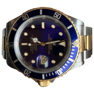 Rolex submariner navy gold and steel watch