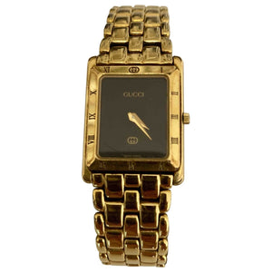 Gucci gold steel watch