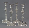 An Exceptional Set of Four Cast Silver Candlesticks London 1764/5