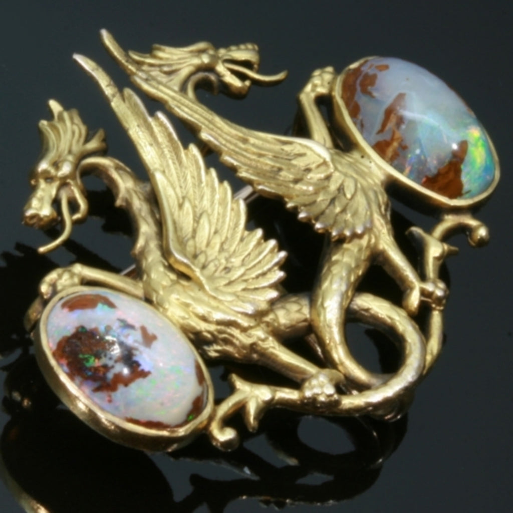 Victorian brooch with two griffins