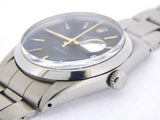 PRE OWNED MENS ROLEX STAINLESS STEEL OYSTERDATE WITH A BLACK DIAL 6694
