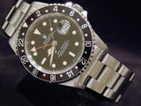 PRE OWNED MENS ROLEX STAINLESS STEEL GMT-MASTER WITH A BLACK DIAL 16700