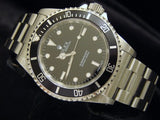 PRE OWNED MENS ROLEX STAINLESS STEEL SUBMARINER WITH A BLACK DIAL 14060M