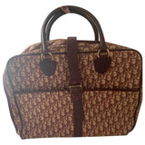 Dior burgundy cloth travel bag