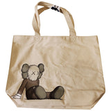 Kaws X Uniqlo ecru cloth handbag