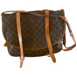 Louis Vuitton saumur brown cloth handbag