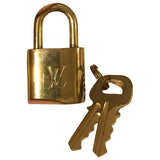 Louis Vuitton brown metal bag charms
