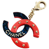 Chanel red plastic bag charms