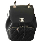 Chanel black leather backpacks