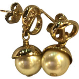 Dior tribal gold metal earrings