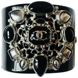 Chanel black plastic bracelets