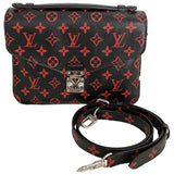Louis Vuitton metis black cloth handbag