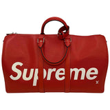 Louis Vuitton X Supreme red leather bag