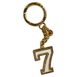 Michael Kors gold metal bag charms