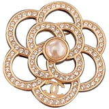 Chanel camélia gold plastic pins & brooches