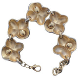 Oscar De La Renta gold metal bracelets