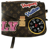Louis Vuitton metis brown cloth handbag