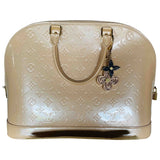 Louis Vuitton alma beige patent leather handbag