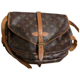 Louis Vuitton saumur brown cloth handbag