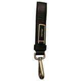 Prada black leather bag charms