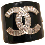 Chanel black plastic bracelets