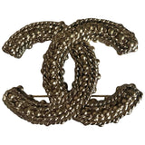 Chanel cc gold metal pins & brooches