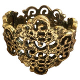Oscar De La Renta gold metal bracelets