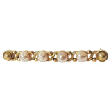 Chanel gold metal pins & brooches