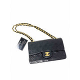Chanel timeless/classique black leather handbag