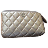 Chanel metallic leather clutch bag