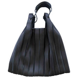 Issey Miyake black synthetic handbag