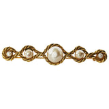 Chanel gold metal pins & brooches