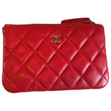 Chanel red leather clutch bag