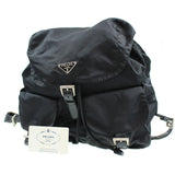 Prada black leather backpacks