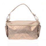 Chanel gold leather handbag
