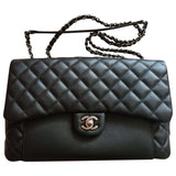 Chanel timeless/classique black leather handbag