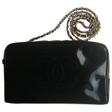 Chanel black patent leather travel bag